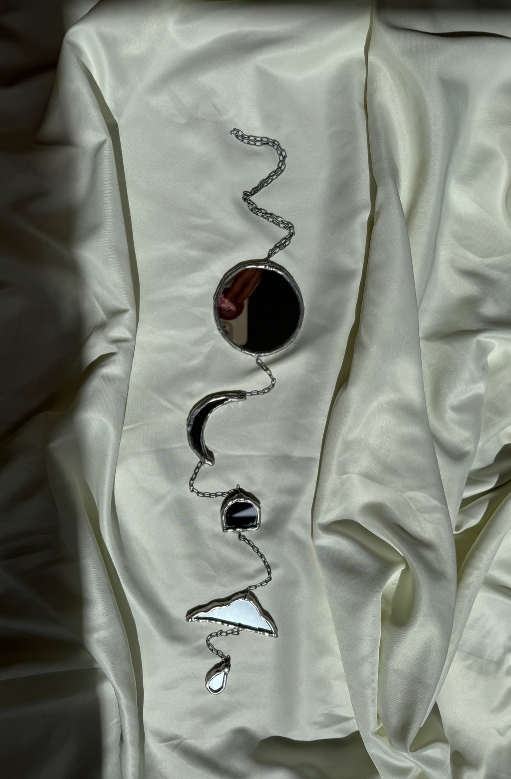 Chain of hangers - Celestial reflection
