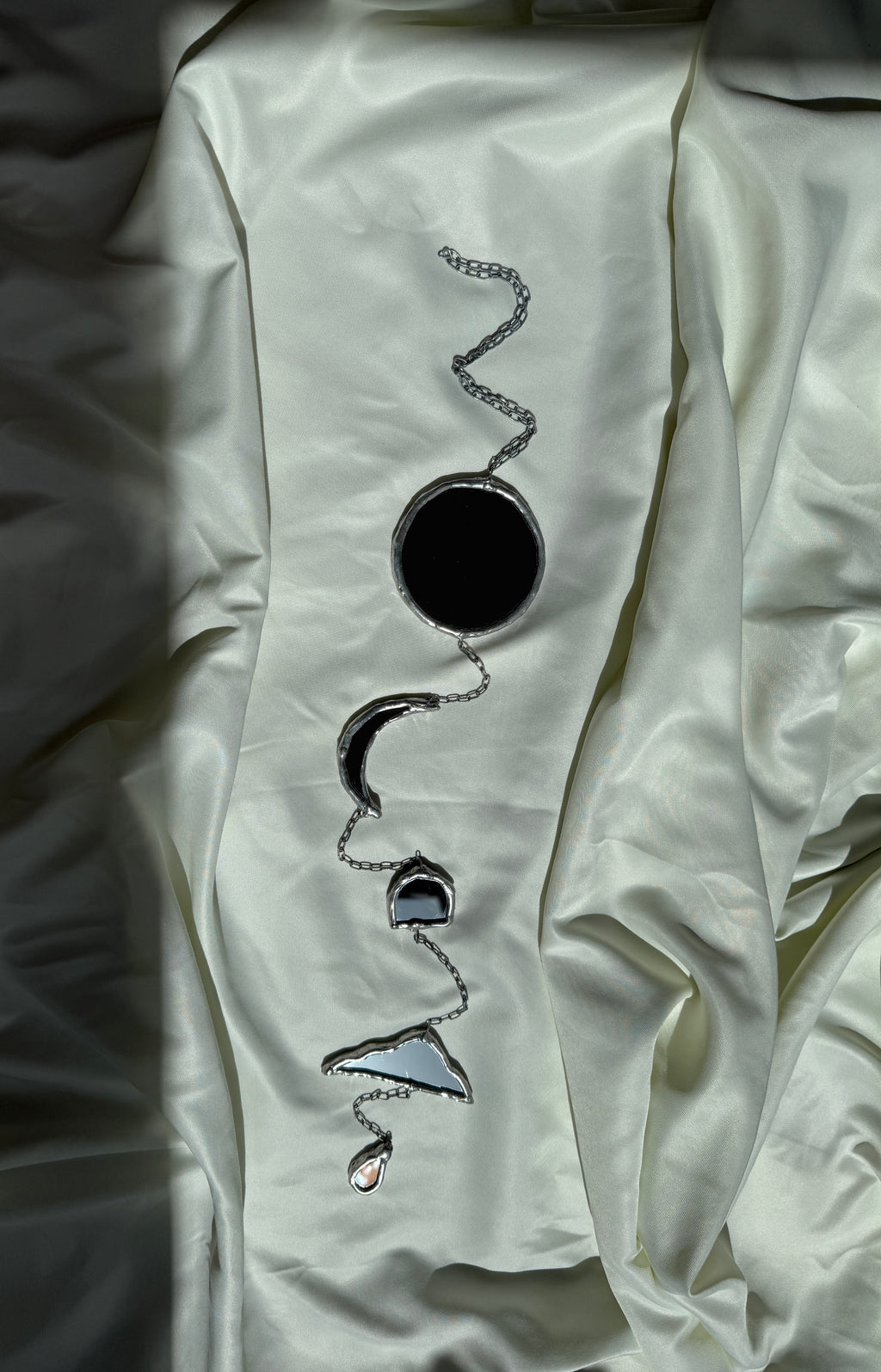 Chain of hangers - Celestial reflection