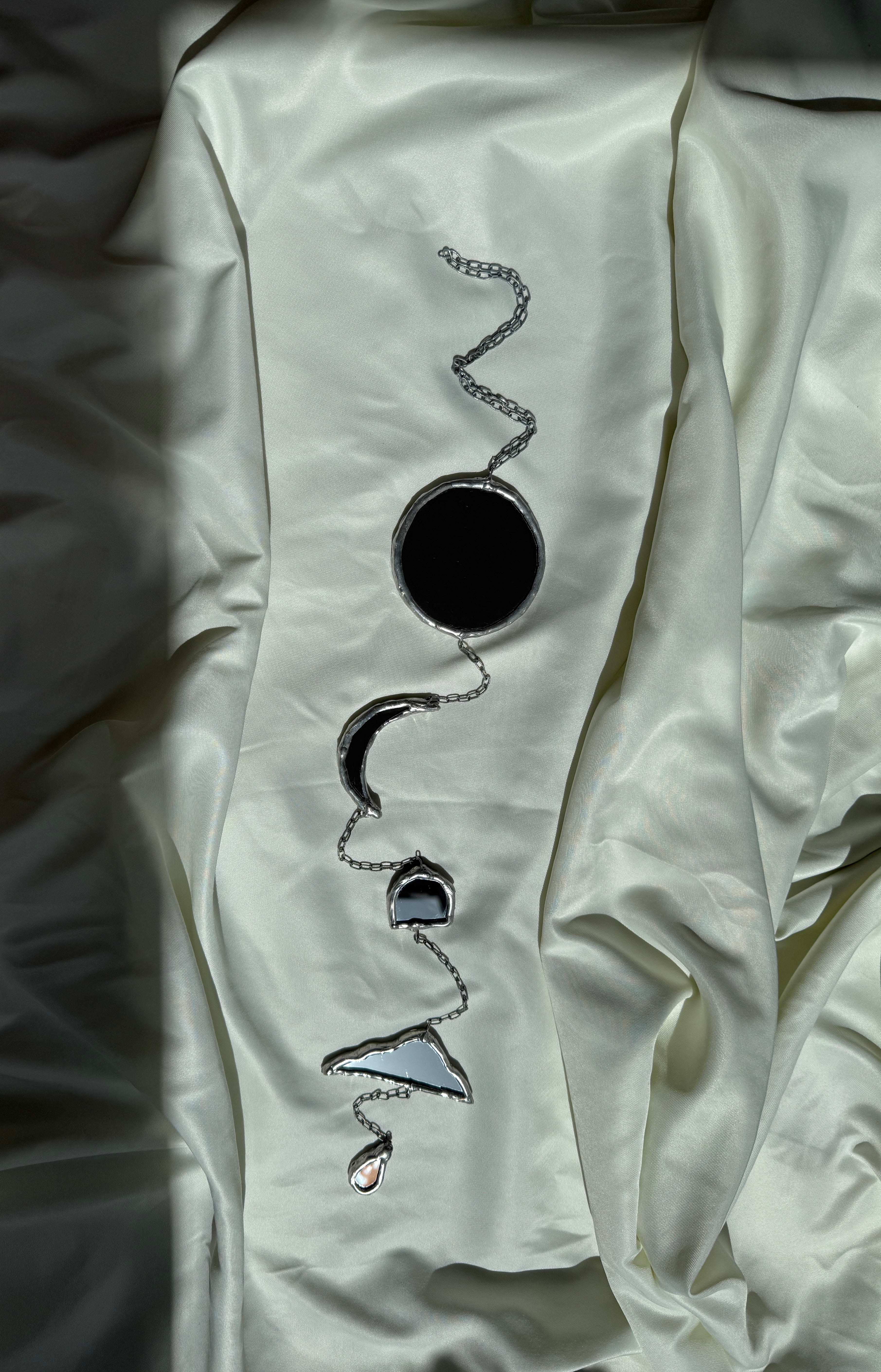 Chain of hangers - Celestial reflection