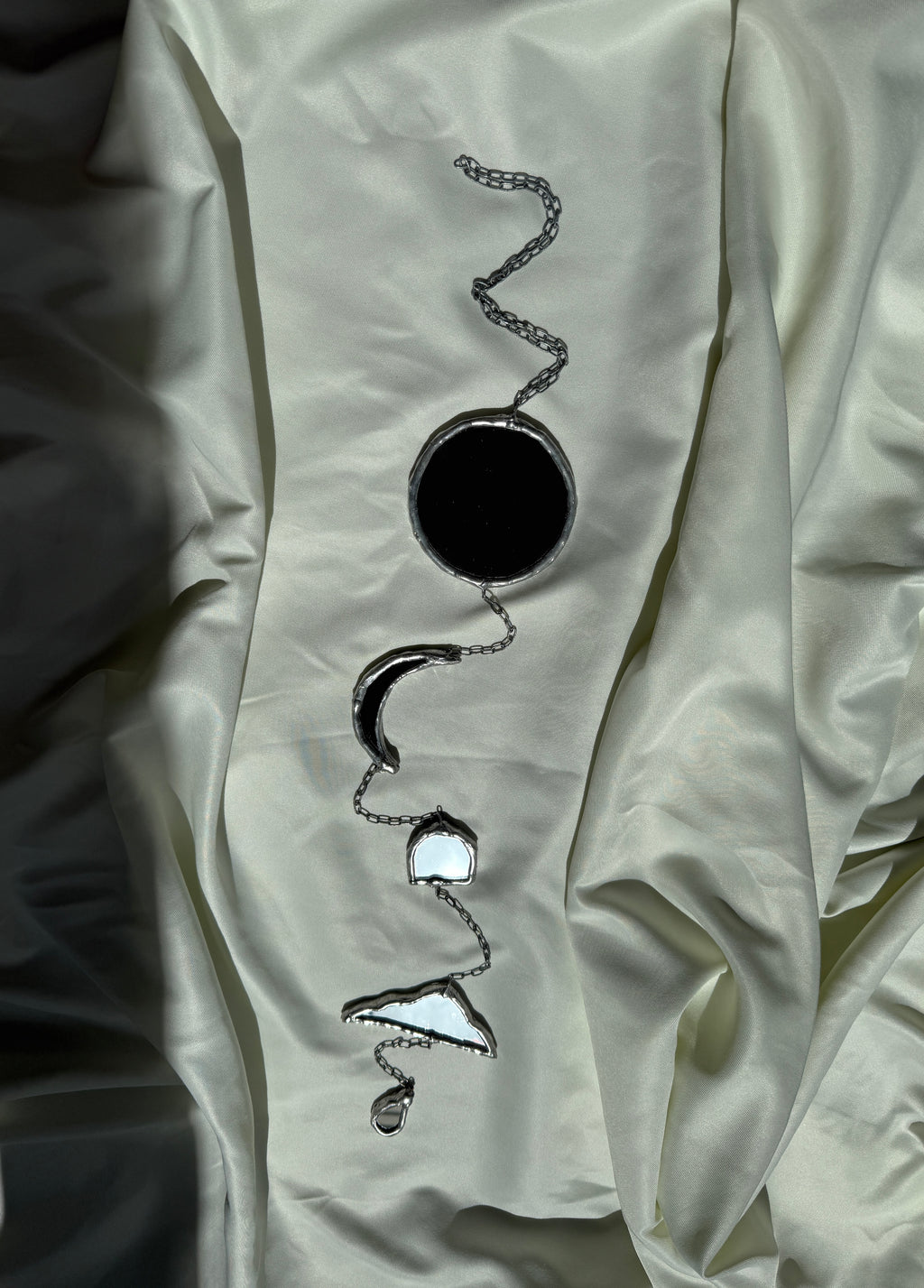 Chain of hangers - Celestial reflection