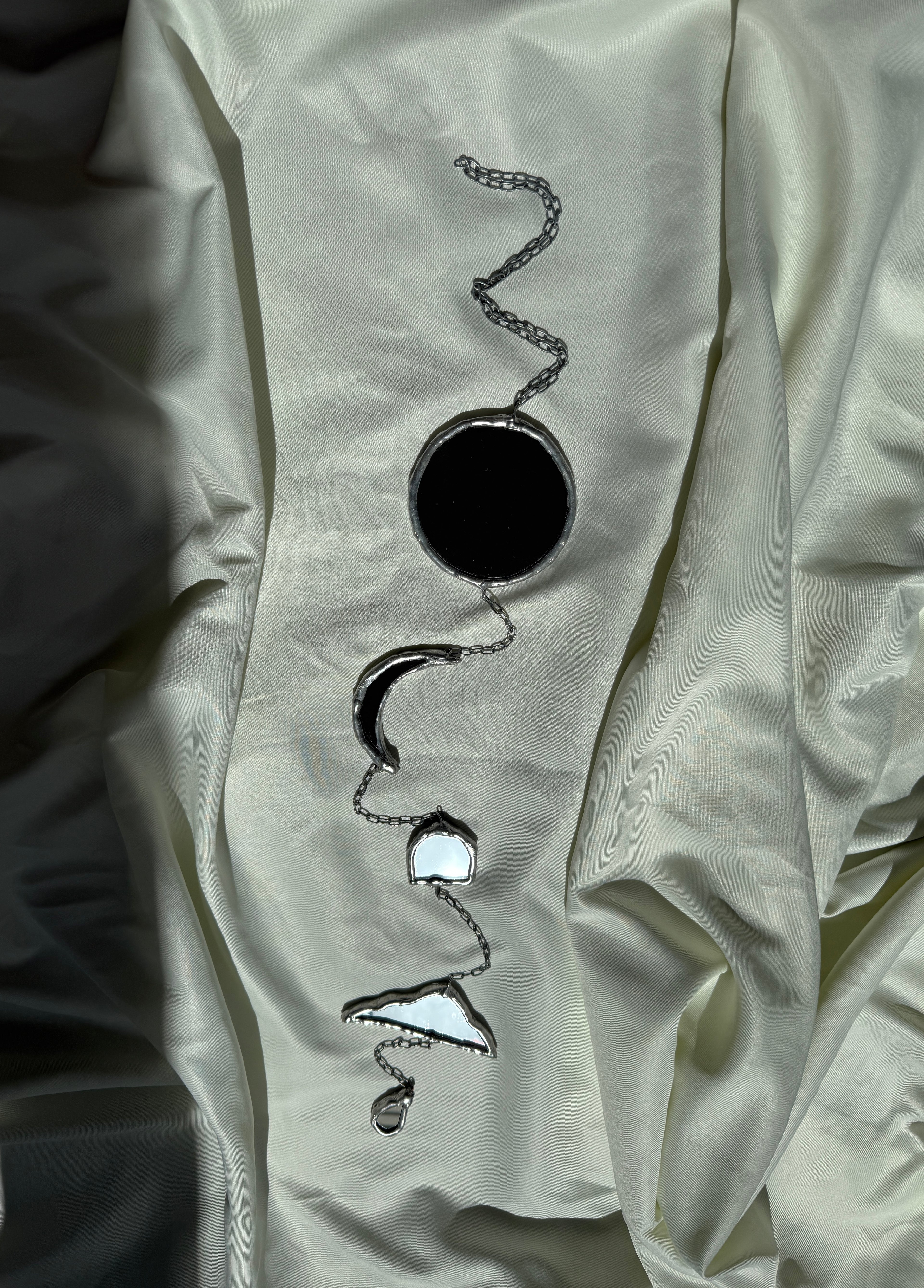 Chain of hangers - Celestial reflection