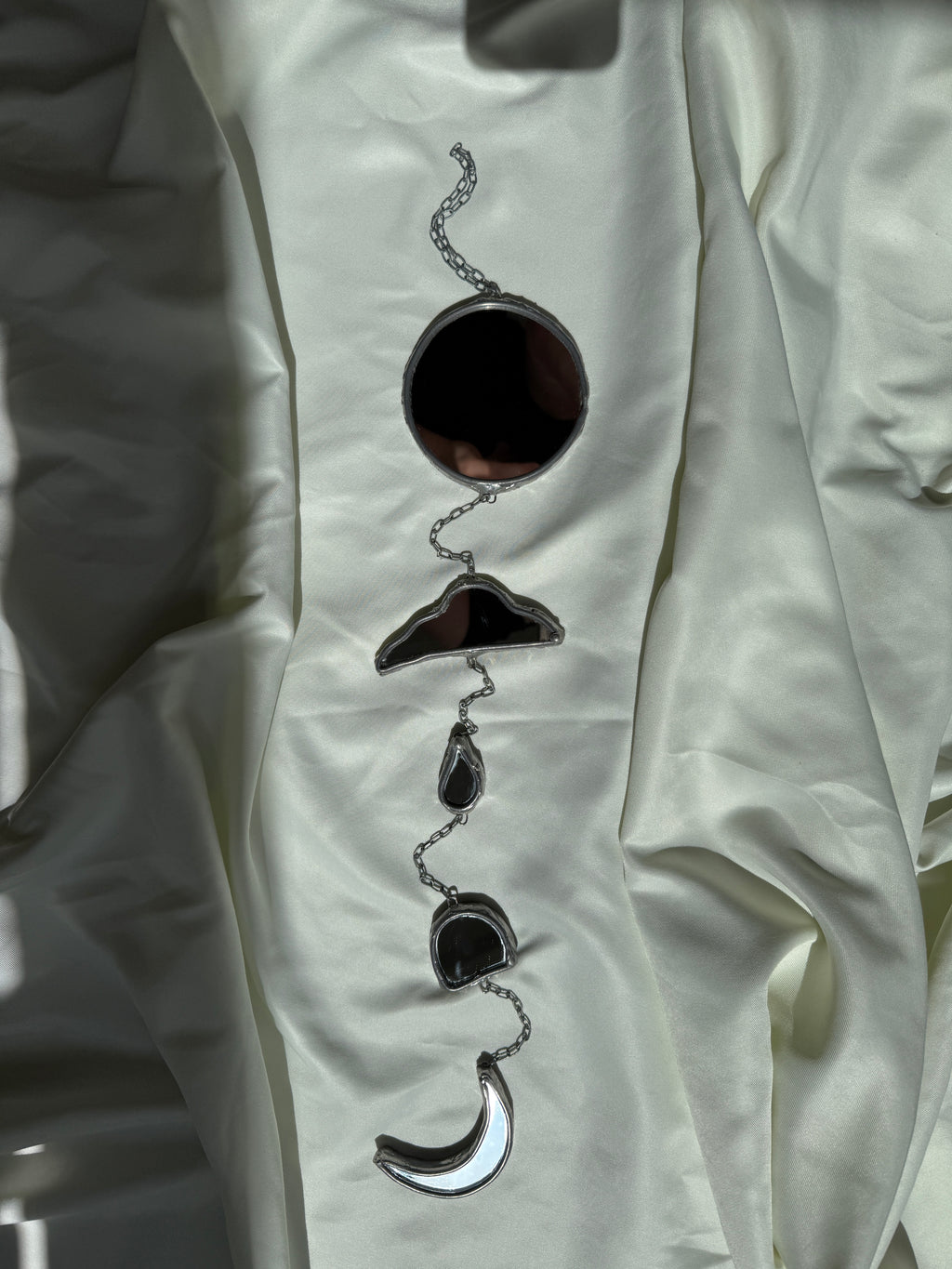 Chain of hangers - Celestial reflection