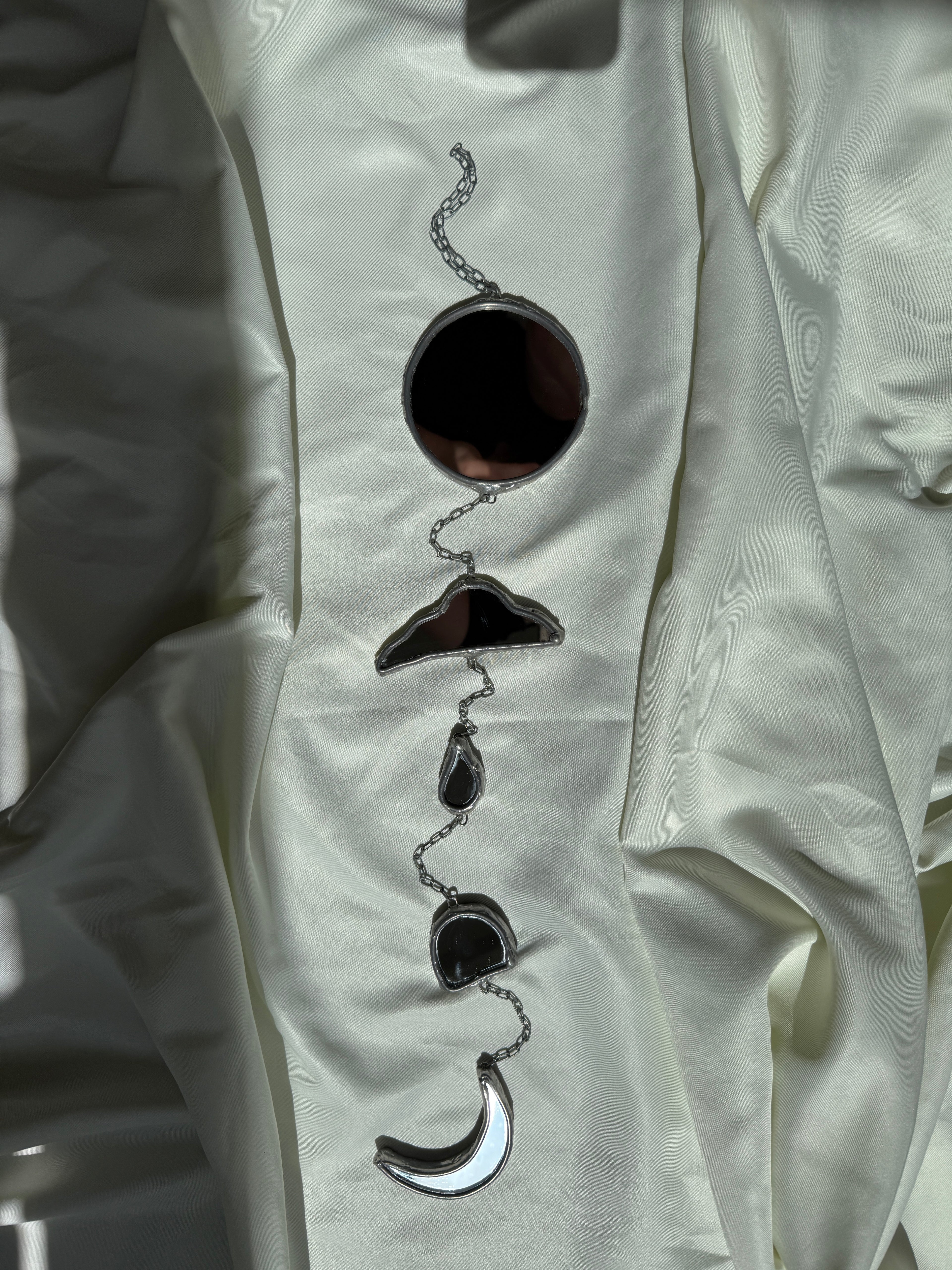 Chain of hangers - Celestial reflection