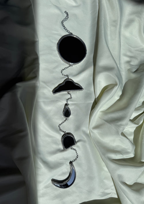 Chain of hangers - Celestial reflection